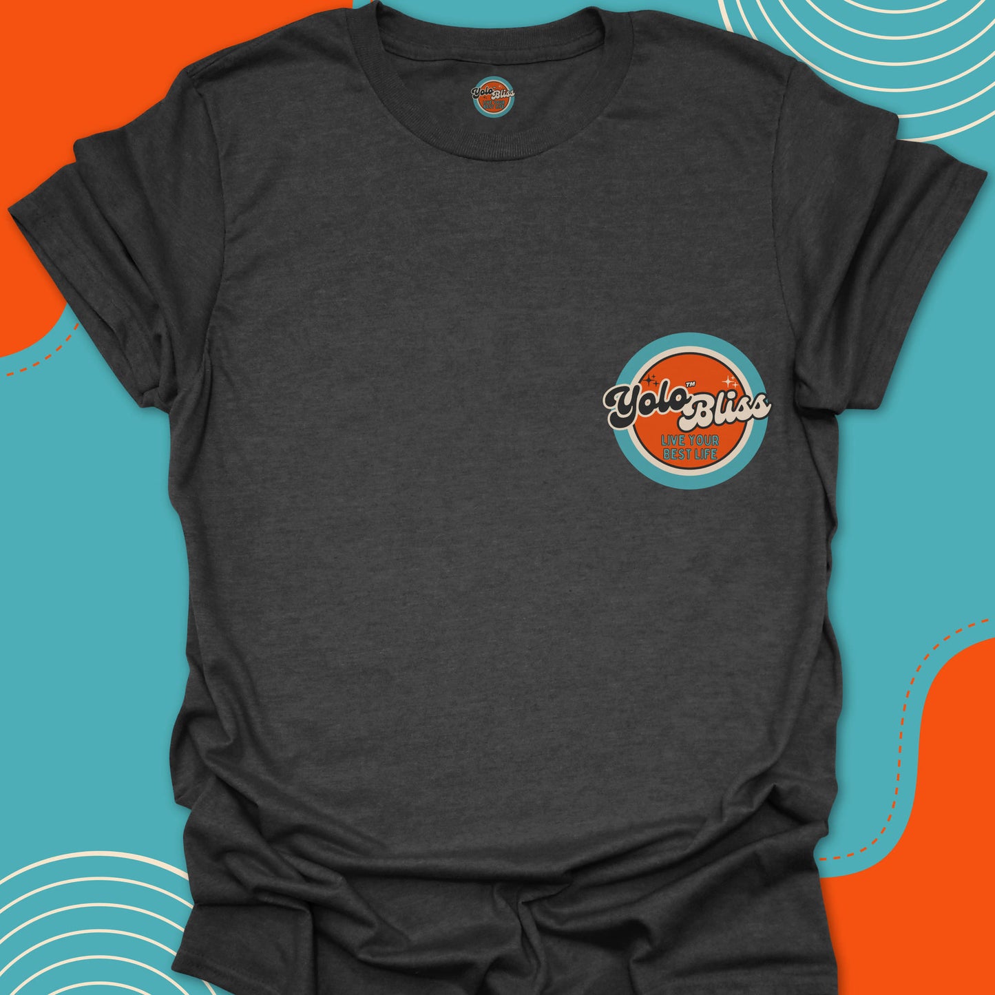 Dark gray t-shirt with a small official "Yolo Bliss, Live your best life" orange and turquoise logo on the chest. YoloBliss