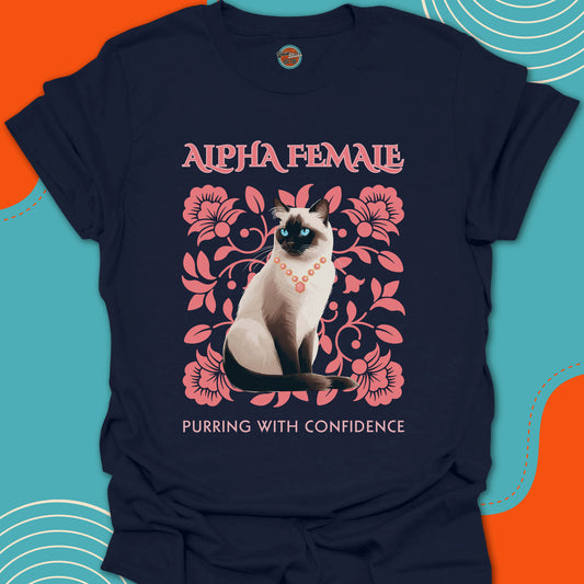 Navy blue t-shirt with a Siamese cat graphic on a pink flowers background design and "Alpha Female purring with confidence" text