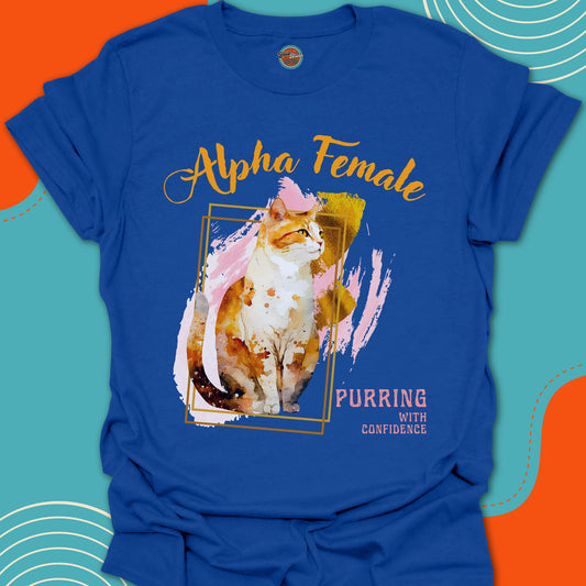Royal blue t-shirt with a orange and white cat graphic on a colorful background design and "Alpha Female purring with confidence" text