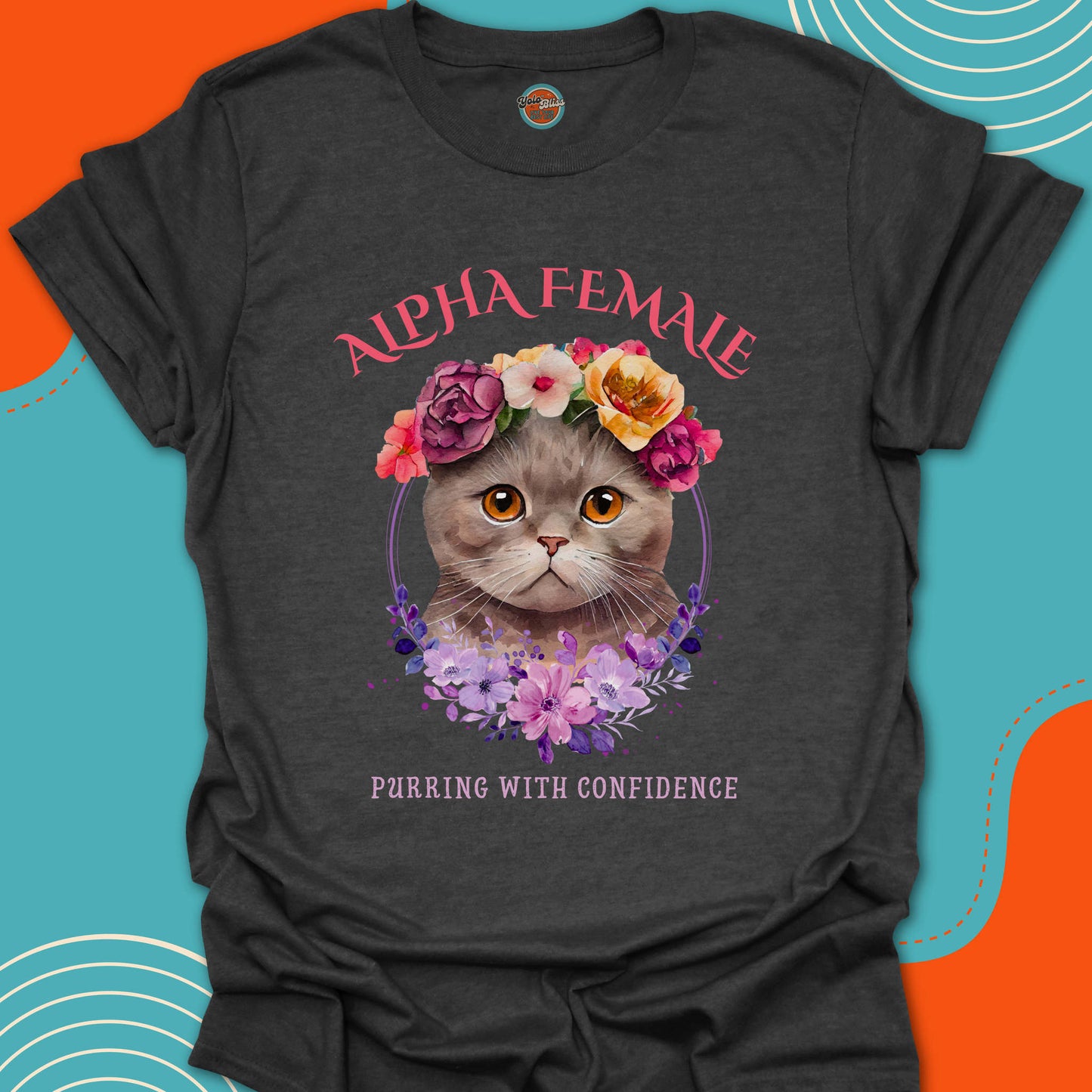 Dark grey t-shirt with a super cute kitten with colorful flowers on his head graphic and "alpha female, purring with confidence" stylish text