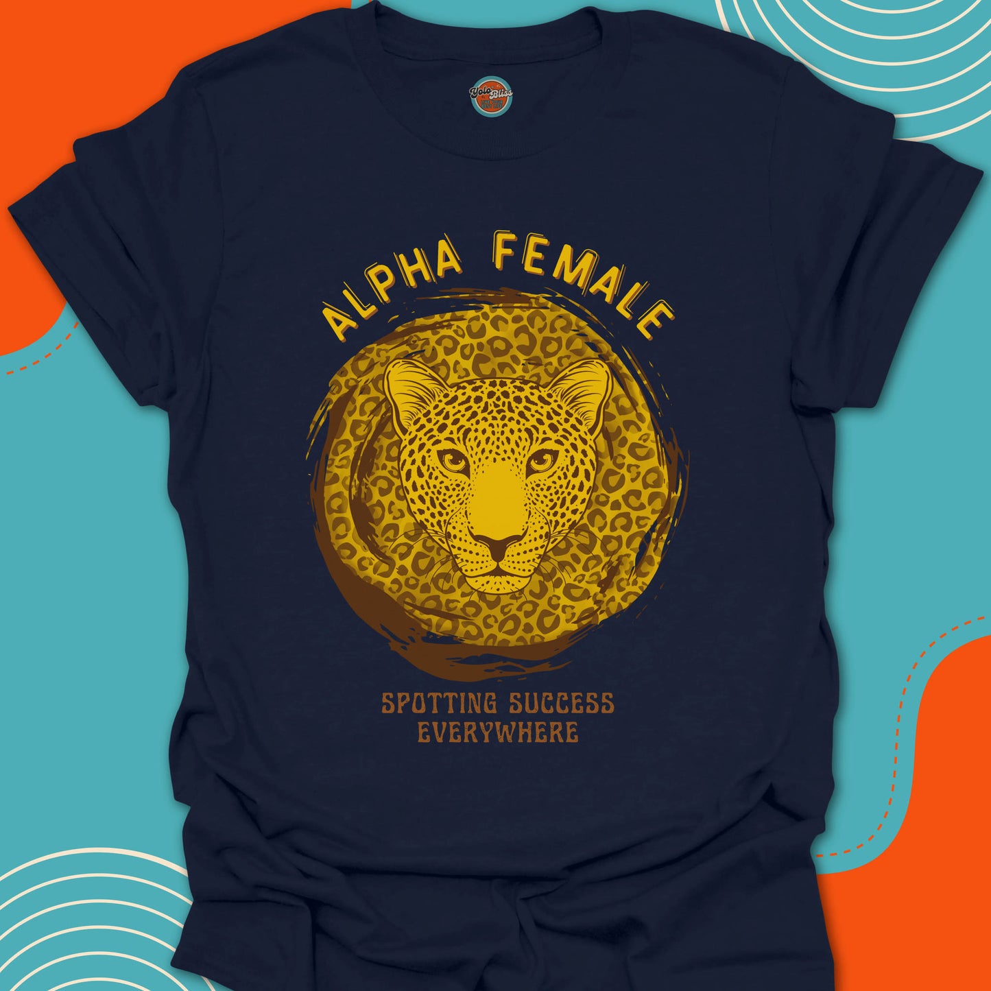 Navy blue t-shirt with a gold leopard graphic and "alpha female, spotting success everywhere" text