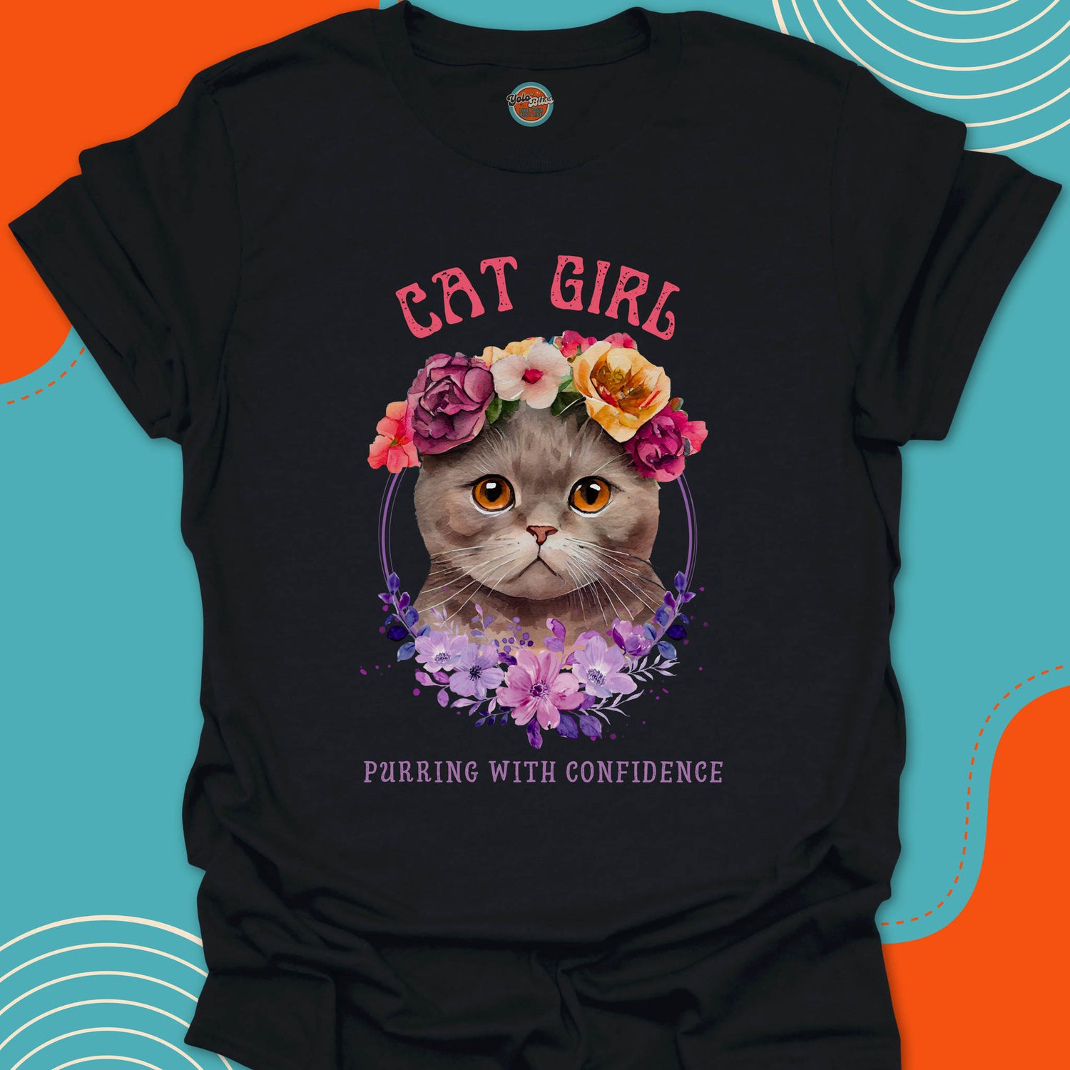 Black t-shirt with a super cute grey kitten with colorful flowers on his head graphic and "Cat Girl, purring with confidence" stylish text