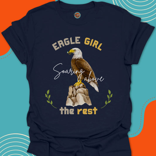 Navy Blue t-shirt with an eagle on a rocky mountain with a diamond ring in his beak graphic and "Eagle Girl, soaring above the rest" text 