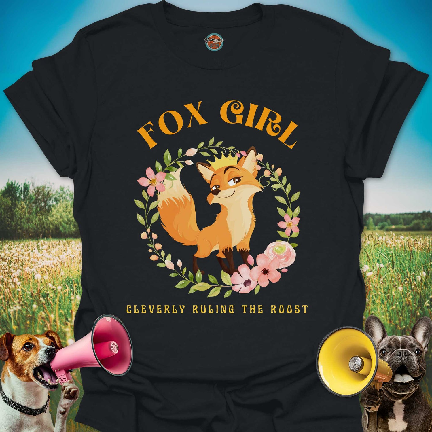Black t-shirt with a cute fox wearing a golden crown on her head and floral circular arrangement graphic and "Fox Girl, cleverly ruling the roost"
