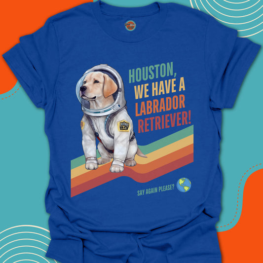 Blue t-shirt with a Labrador Retriever in an astronaut suit graphic and text on a colorful background
