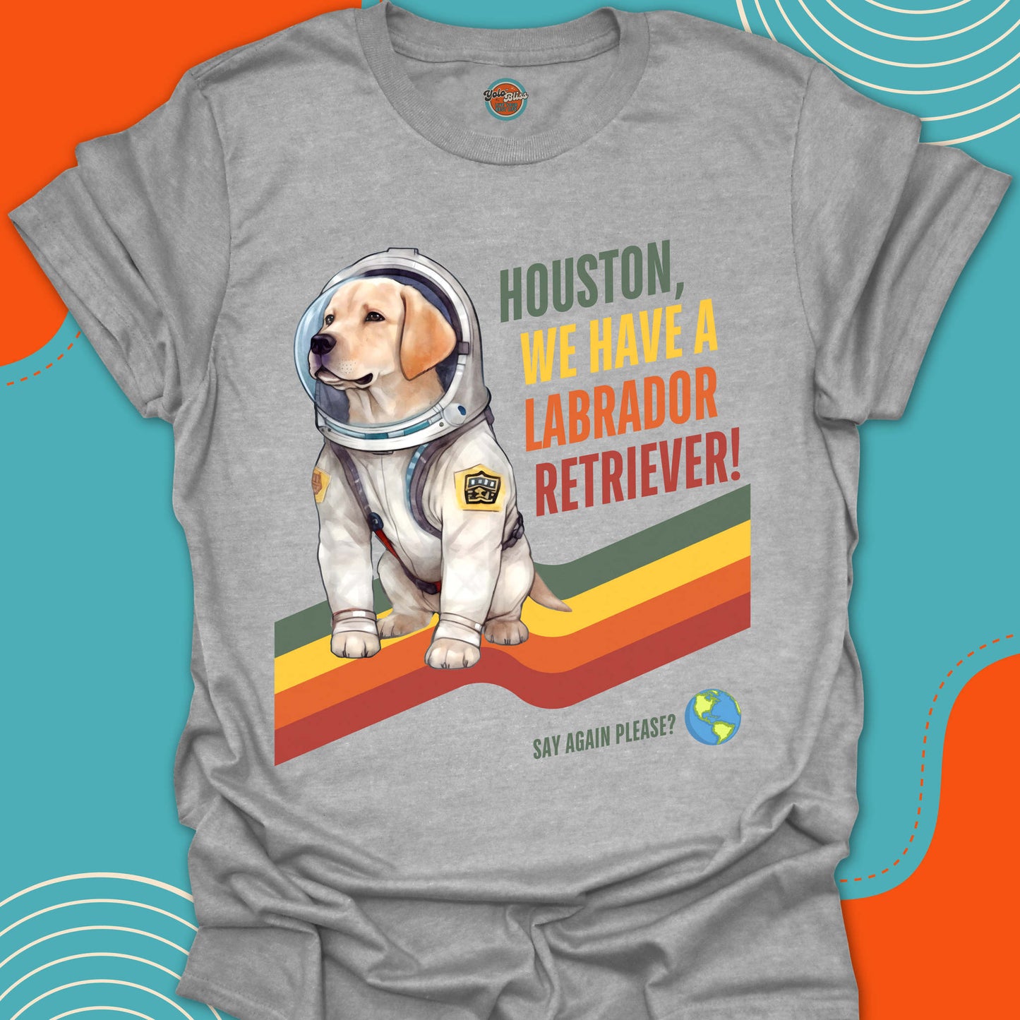 Gray t-shirt with a Labrador Retriever in an astronaut suit graphic and text on a colorful background