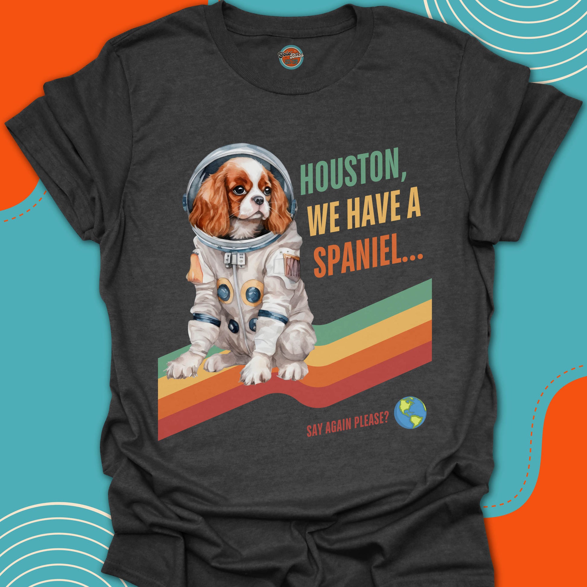 T-shirt with a cocker spaniel dog in an astronaut suit graphic and text on a colorful background