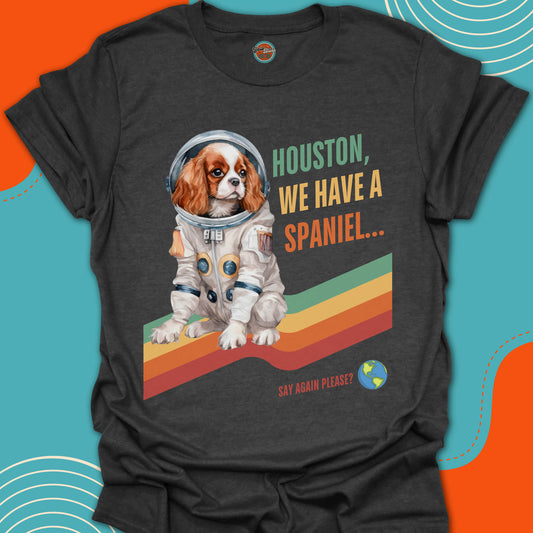 T-shirt with a cocker spaniel dog in an astronaut suit graphic and text on a colorful background