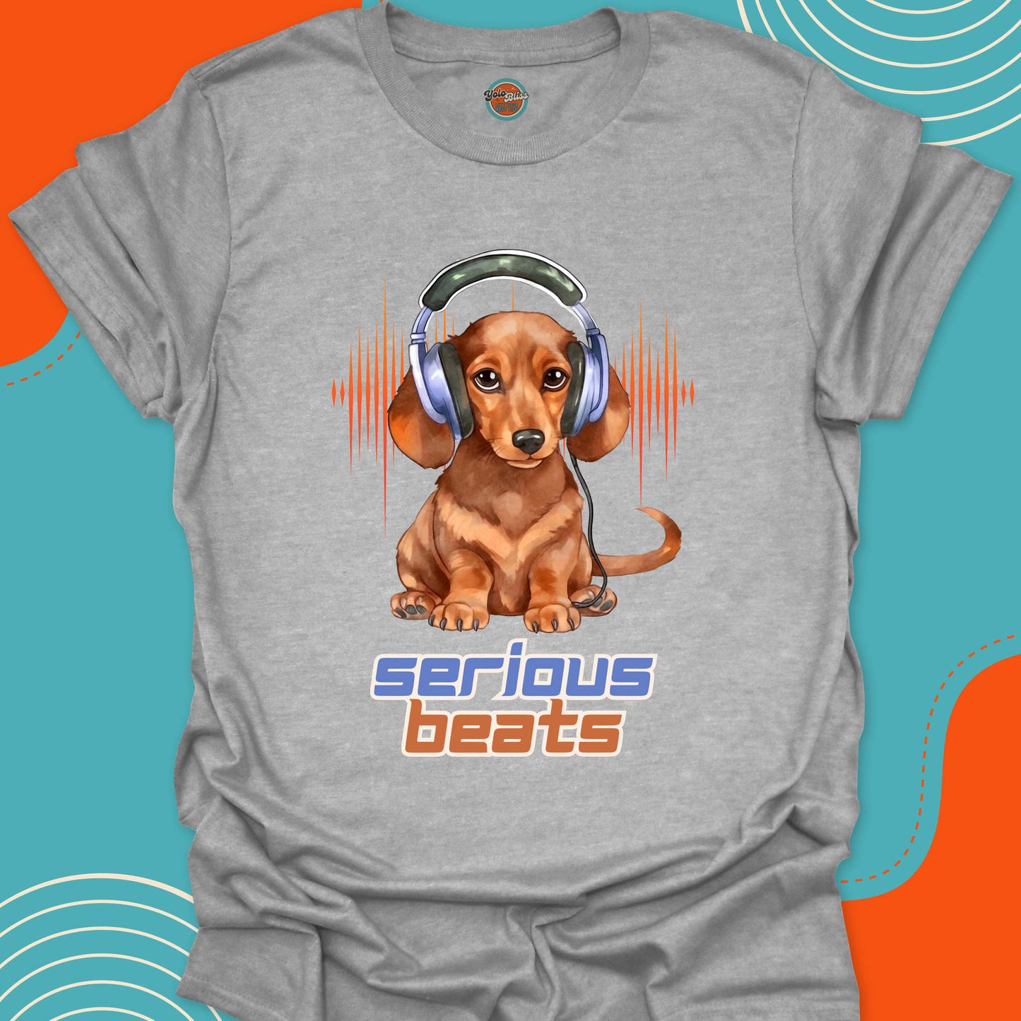 Gray t-shirt with a dachshund dog wearing big headphones graphic and 'serious beats' text with a soundwave background