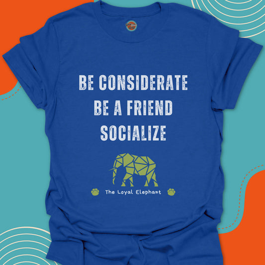 Royal blue t-shirt with motivational text "Be considerate, be a friend, socialize" and green puzzle elephant graphic