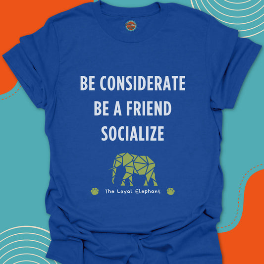 Royal blue t-shirt with motivational text "Be considerate, be a friend, socialize" and green puzzle elephant graphic