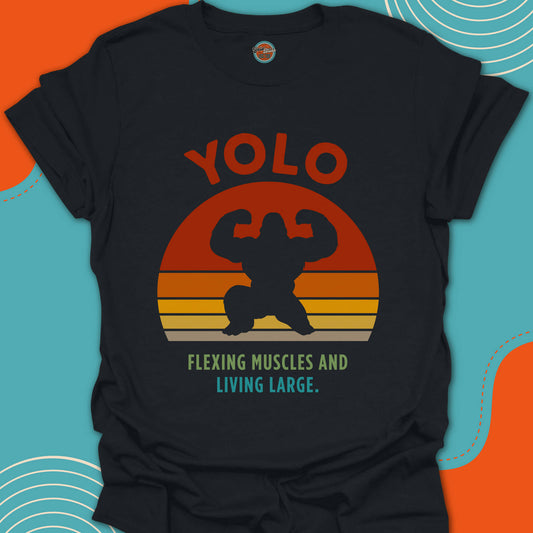 Black t-shirt with 'YOLO Flexing Muscles and Living Large' text and a large gorilla graphic design on a funky sunset background