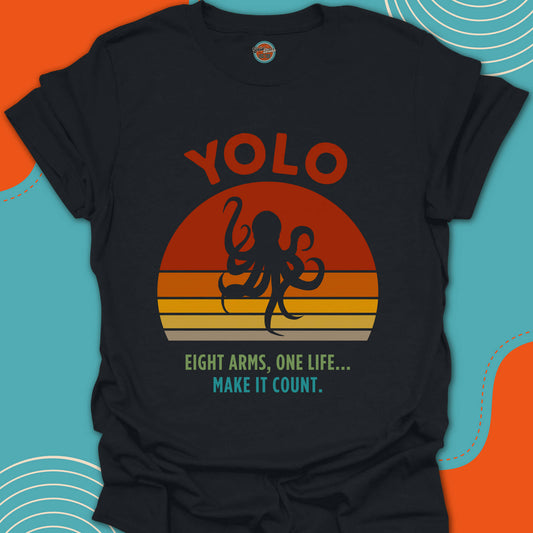 Black t-shirt with an octopus silhouette graphic and "eight arms, one life, make it count" text on a trending sunset background
